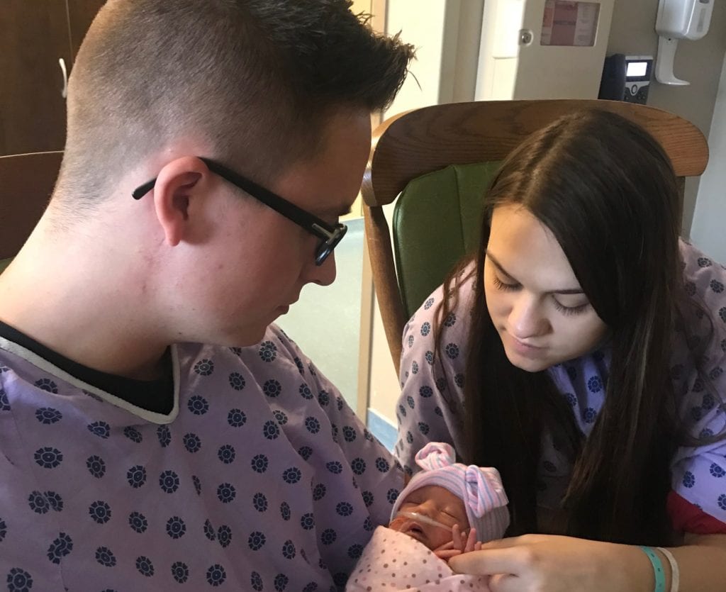 Proud parents, Brooke and Dakota Smith of Clarksville, Tenn. hold their new baby girl, Isabella who was treated in the TriStar Centennial Women’s Hospital NICU.