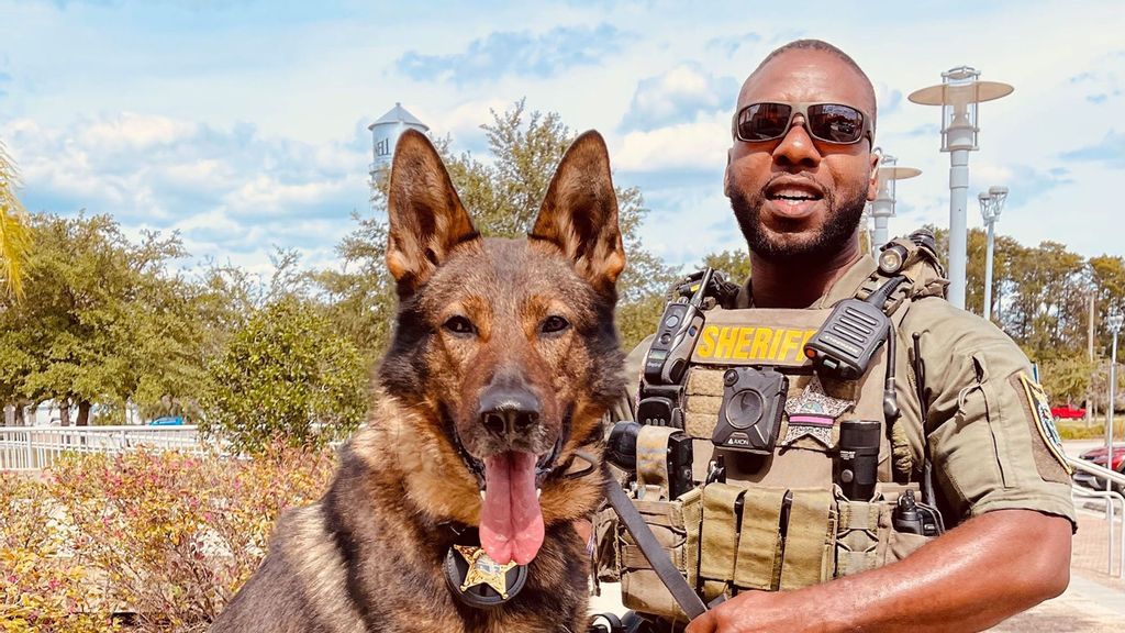 Deputy Dawson with his K-9 partner, Baro. Dawson rescued toddlers from a burning house in Flagler County, Florida.  (Flagler County Sheriff's Office/Zenger)