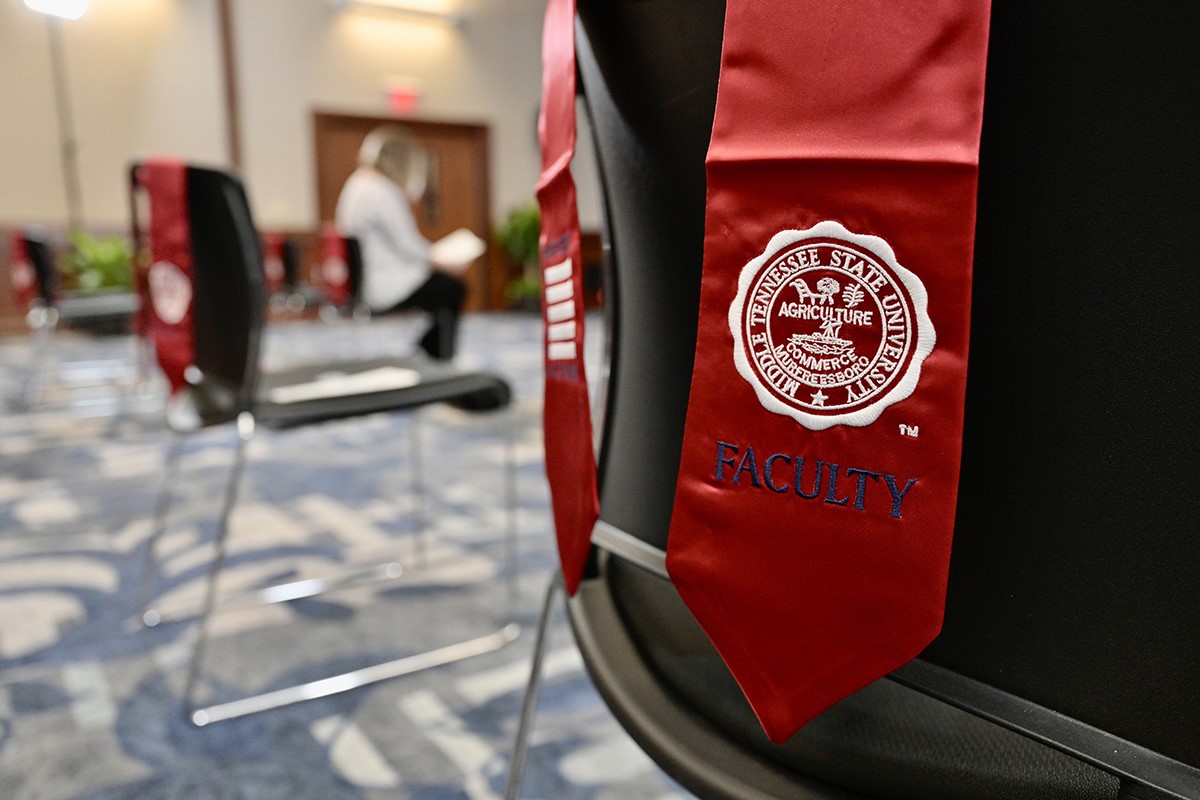 A red stole rests on the back of a chair in the Sam H. Ingram Building’s MT Center before the annual MTSU Faculty-Staff Veterans Stole Ceremony Wednesday, Nov. 10. The stoles were given to MTSU faculty and staff who have served or continue to serve in any U.S. military branches. The stoles can be worn during any future MTSU commencement ceremonies or stole ceremonies.  (MTSU photo by Andy Heidt)