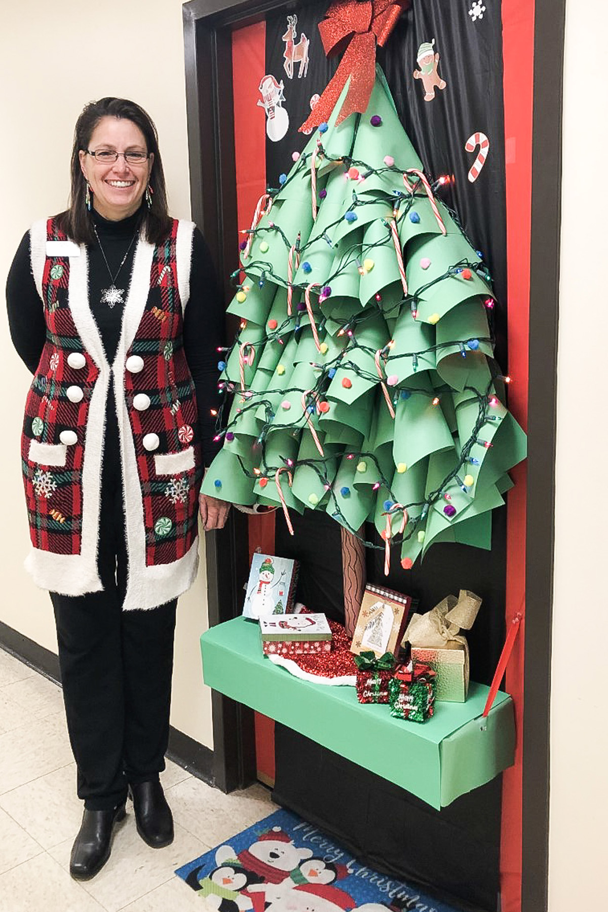 Sonya Sanderson, chair of the Health and Human Performance department at Middle Tennessee State University, helped launch a department-wide holiday door décor competition, and she won third place for her Christmas tree-themed door on the Thursday, Dec. 1, 2022, judging at the Murphy Center on campus. (Photo courtesy of Sonya Sanderson)