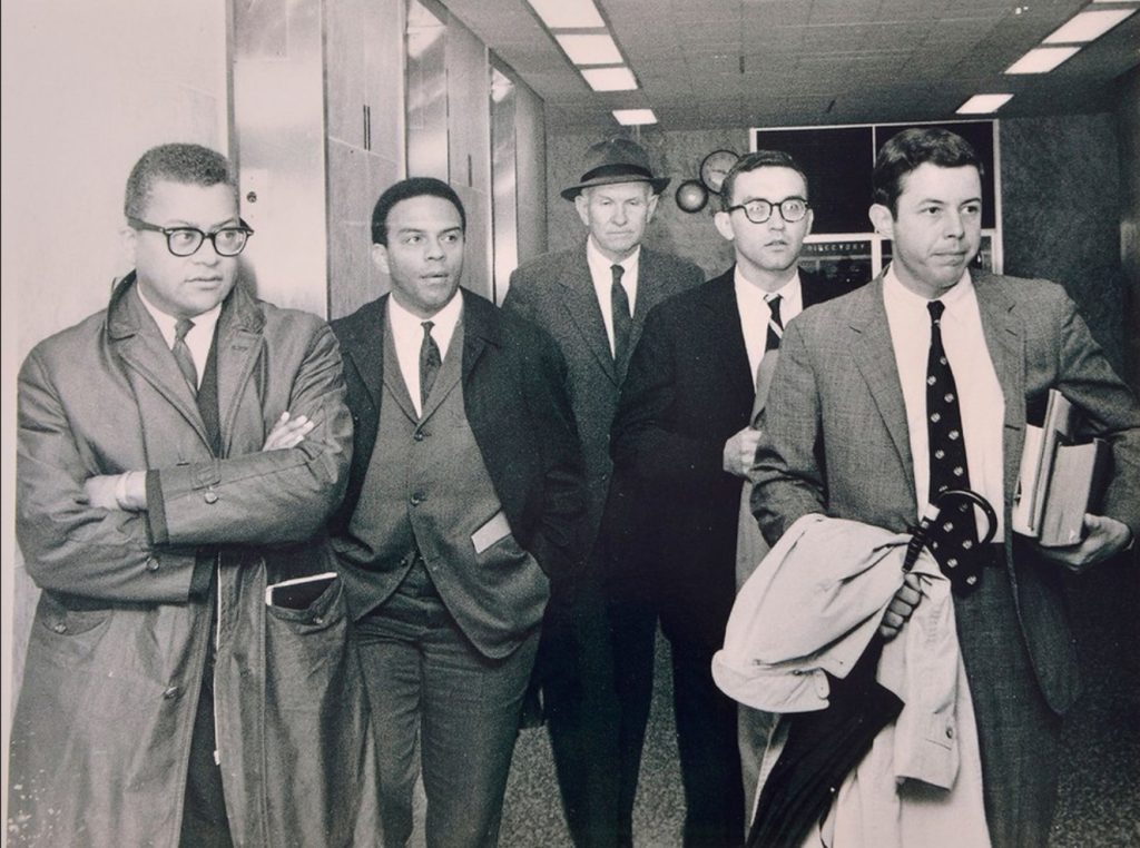 Entering federal court on April 4, 1968, to address the injunction against Dr. Martin Luther King Jr. are, left to right, King advisors James Lawson and Andrew Young, along with lawyers Lucius Burch, Charlie Newman, and Mike Cody. Photo: Tom Barber, Memphis Press-Scimitar newspaper morgue, Special Collections Department, University of Memphis Libraries