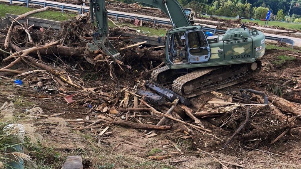 Engineers from the 230th Engineer Battalion remove debris in Erwin, Tennessee, with a hydraulic excavator on October 2. More than 100 engineers from the Tennessee Army and Air National Guard are supporting recovery operations in East Tennessee counties impacted by severe flooding following Hurricane Helene. (submitted photo)