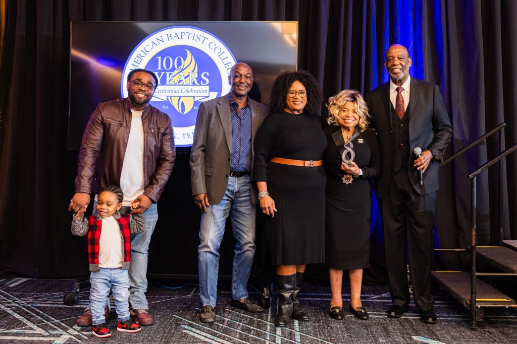 The American Baptist College Centennial Impact Award (L-R) Caleb Neal Jr., Caleb Neal Sr., Jeff Crowley, Sherri Neal Crowley, Regina Prude and President Forrest Harris delight in the congratulatory moment.