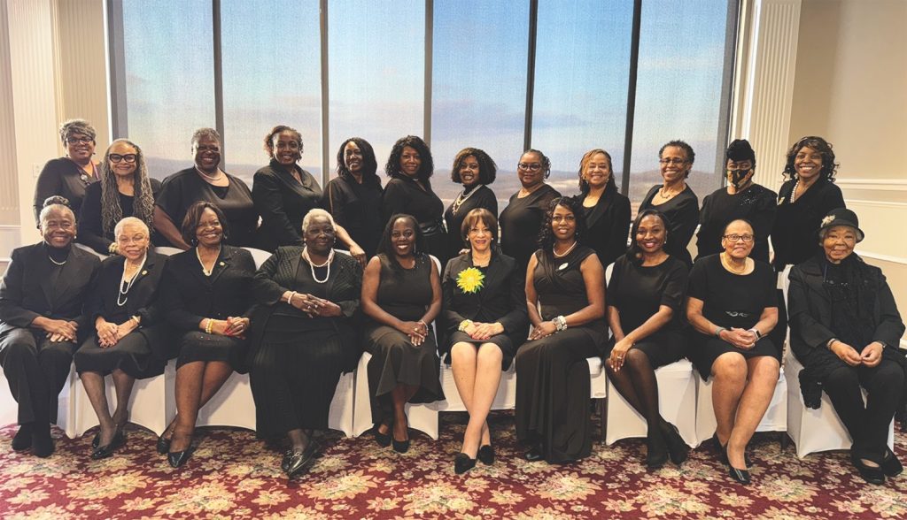 STANDING, left to right: Rhonda Evans, Dr. Freida Outlaw, Deirdre Clark, Tonise Robinson, Dean of Membership, Dr. Pinky Noble-Britton, Terrie Moody, Sharon Pendleton, Benita Short, Dr. LaTonya King, Dr. Beverly Davidson, Dr. Amelia Bryant, Michelle Griffin SITTING, left to right: Dr. Annie Carter, Betty Wilson, Chairman, Betty Thompson, Chapter Historian, Bernice Barnes, Co-Chairman, Samantha Agee, 2nd National Vice President, Virginia McClain, Chapter President, Mechele Neal, Chapter Vice-President, LaTasha Bolden, Chapter Secretary, Dr. Antionette Rawls, Dr. Mary Pleas