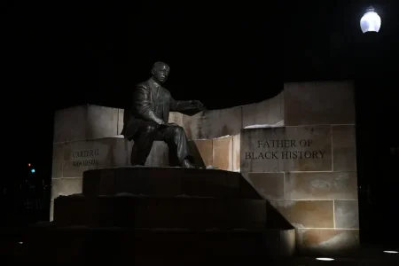 A sculpture of Carter G. Woodson in a Washington, D.C., park last year. Woodson’s dedication to celebrating the historic contributions of Black people led to the establishment of Black History Month.Credit...Kenny Holston/The New York Times