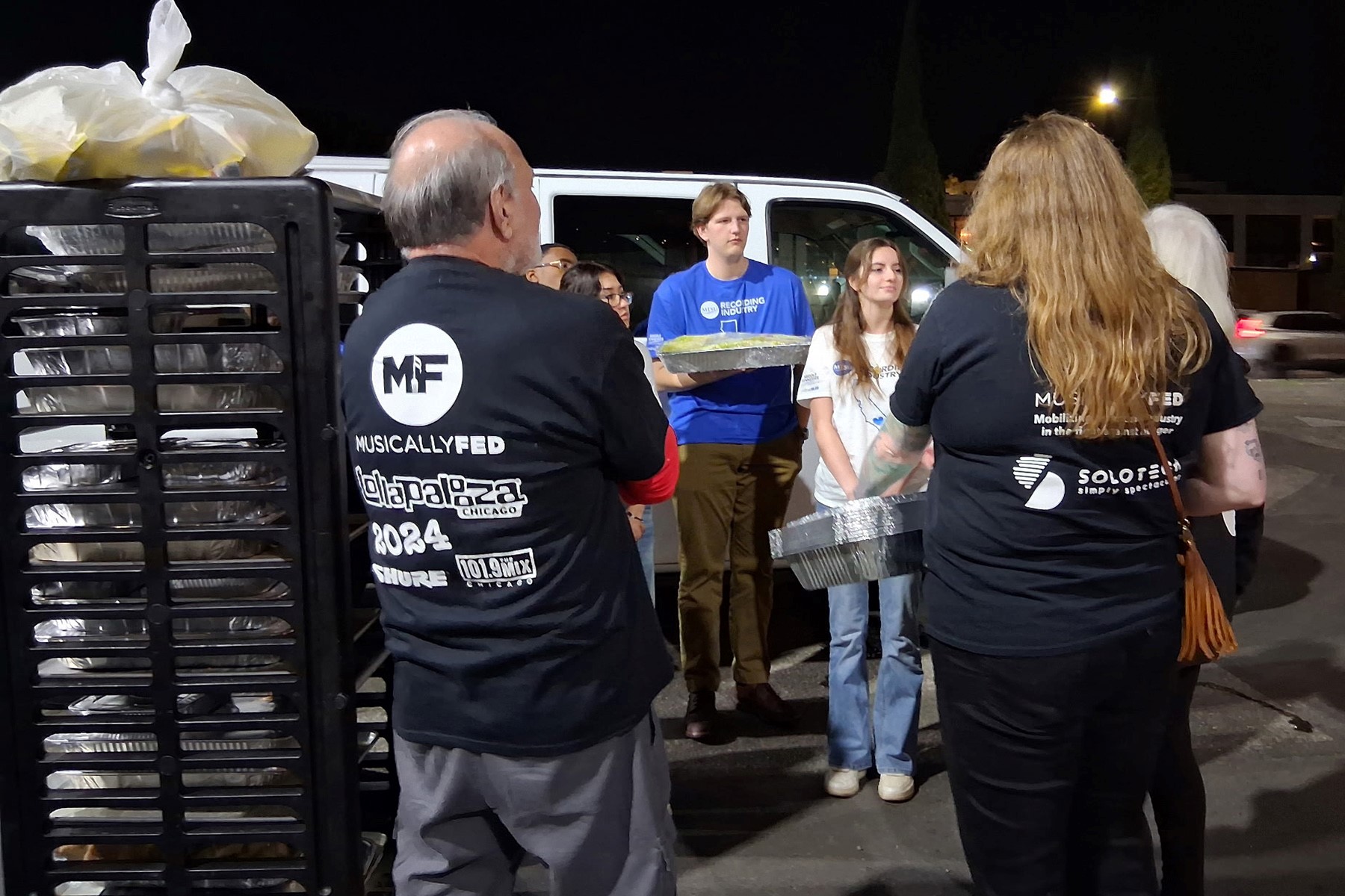 Several College of Media and Entertainment students from Middle Tennessee State University in Murfreesboro, Tenn., volunteer early Sunday, Feb. 2, in Los Angeles with Musically Fed, which works with artists, promoters, management and venues nationwide to donate unused backstage and event meals to community organizations that feed people facing homelessness, hunger and food insecurity. Students picked up from legendary music promoter Clive Davis' pre-Grammy party. (MTSU photo by Holly Allen)