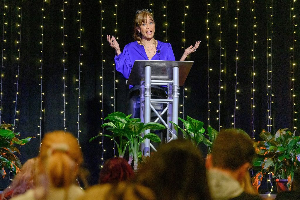 Seattle real estate investor and author Dana Frank shares remarks as the Black History Month keynote speaker at Middle Tennessee State University in Murfreesboro, Tenn. She told the crowd gathered at MTSU’s Keathley University Center Theater Tuesday, Feb. 18, to “light a flame and make it bright.” (MTSU photo by J. Intintoli)