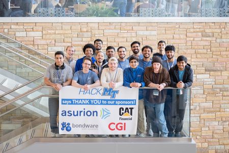 “Blue Buddy,” a 16-member team, earned the judges’ Hackers’ Choice Award during the 10th annual Middle Tennessee State University Computer Science Department HackMT in the MTSU Science Building on campus in Murfreesboro, Tenn., on Sunday, Feb. 2. Some 130 students on 15 teams spent 36 hours nonstop collaborating on apps and other tech-savvy projects. (MTSU photo by Cat Curtis Murphy)