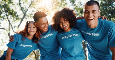 Volunteer, friends and portrait of people in park for recycle program, earth day or social responsibility. Environment, climate change and NGO with group in nature for non profit, cleaning or charity (Photo by Jacob Wackerhausen)