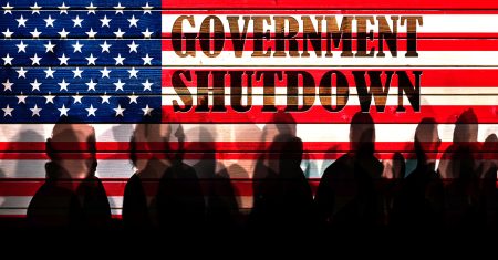 Lot of people shadows against USA flagged fence, shutdown concept